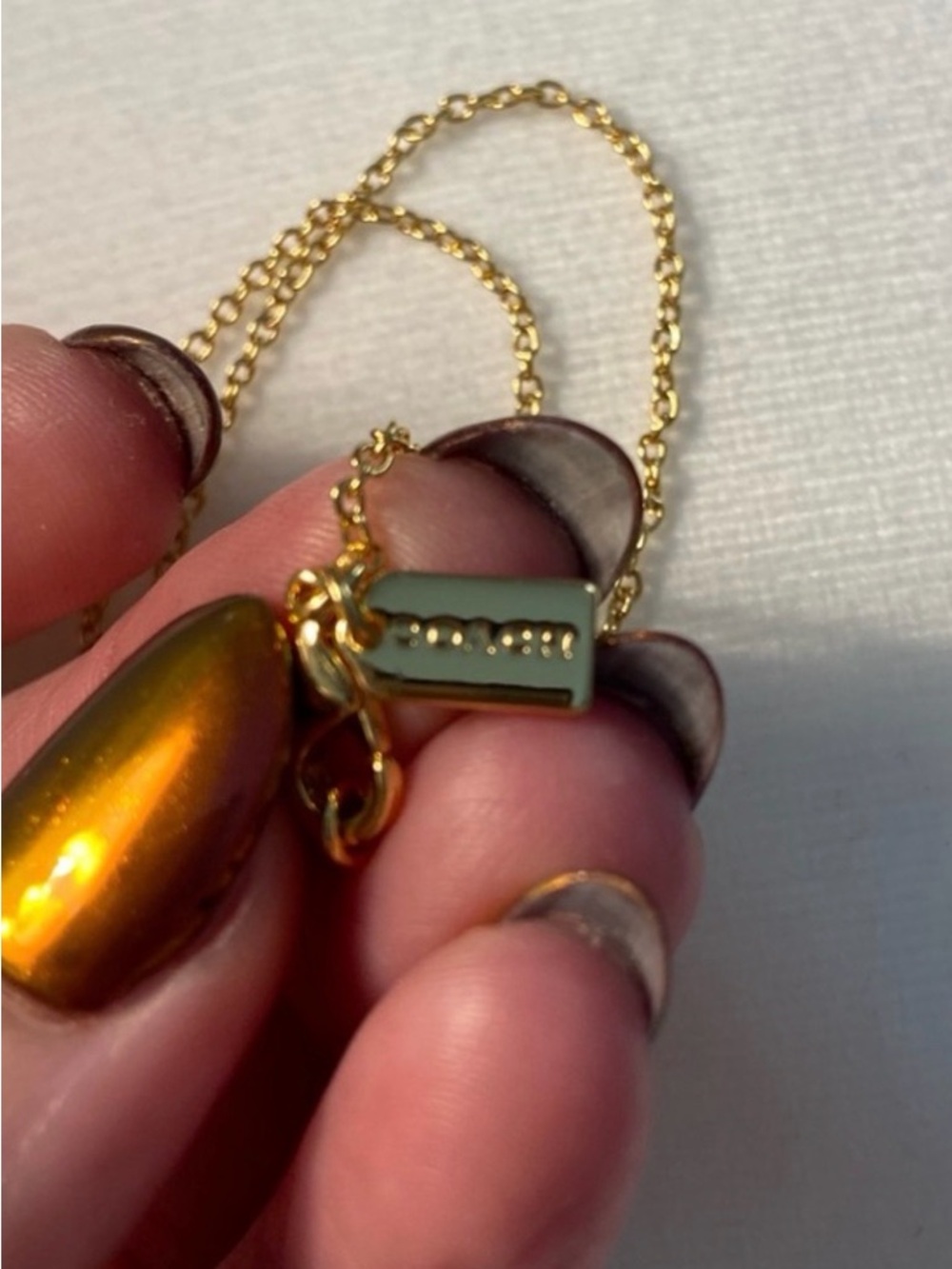 Coach NWOT Gold Flower Pendant Necklace with Clear Stone - Picture 6 of 11